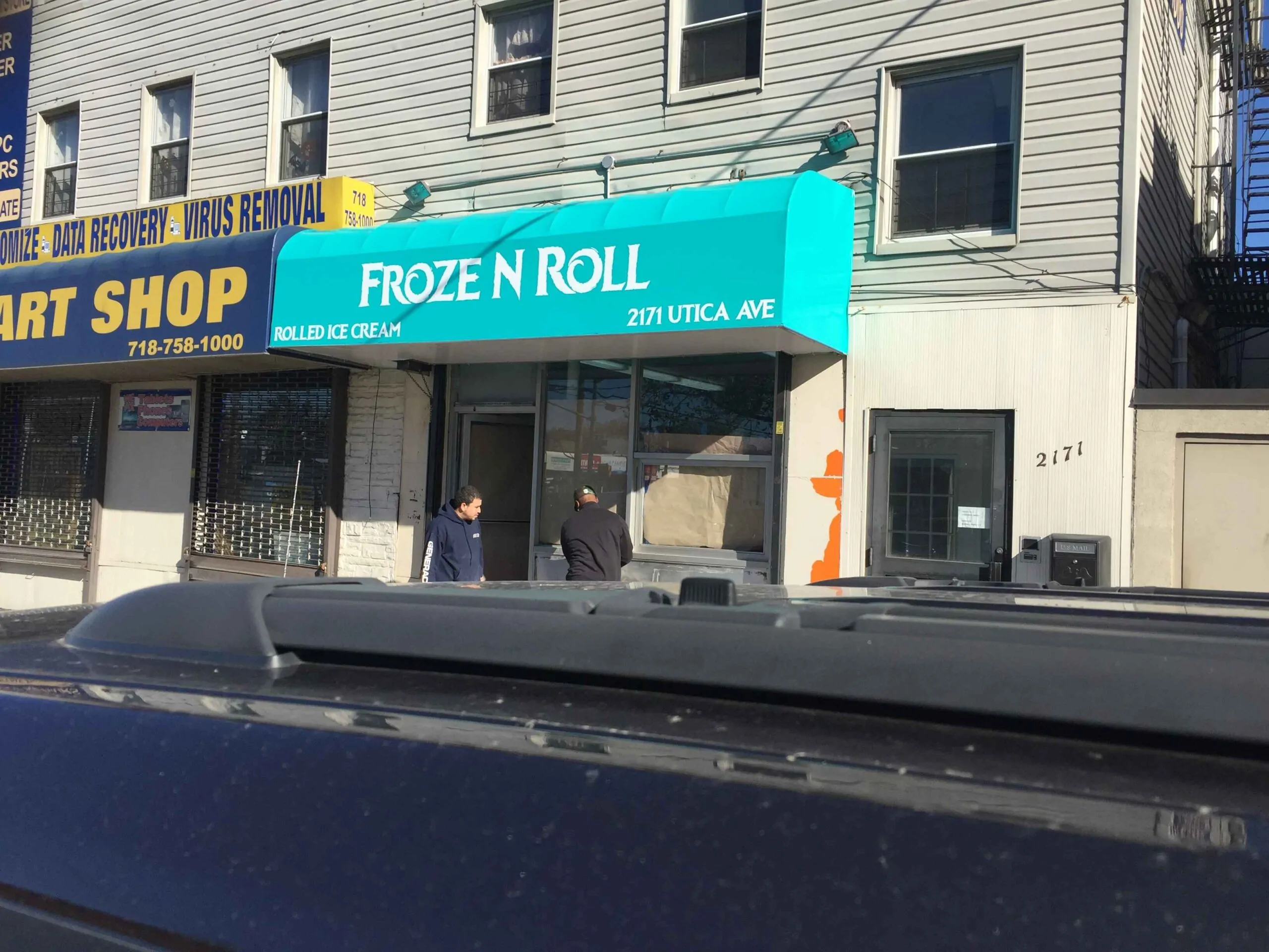 frozen n roll ice cream shop awning
