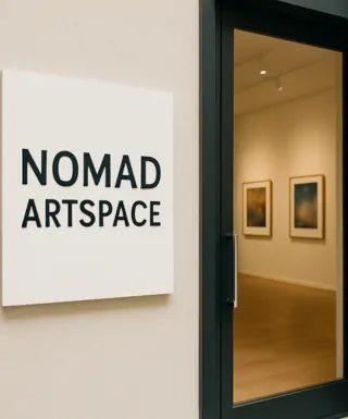 nomad artspace wall sign
