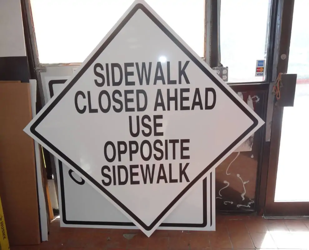 sidewalk closed constructions signs for buildings