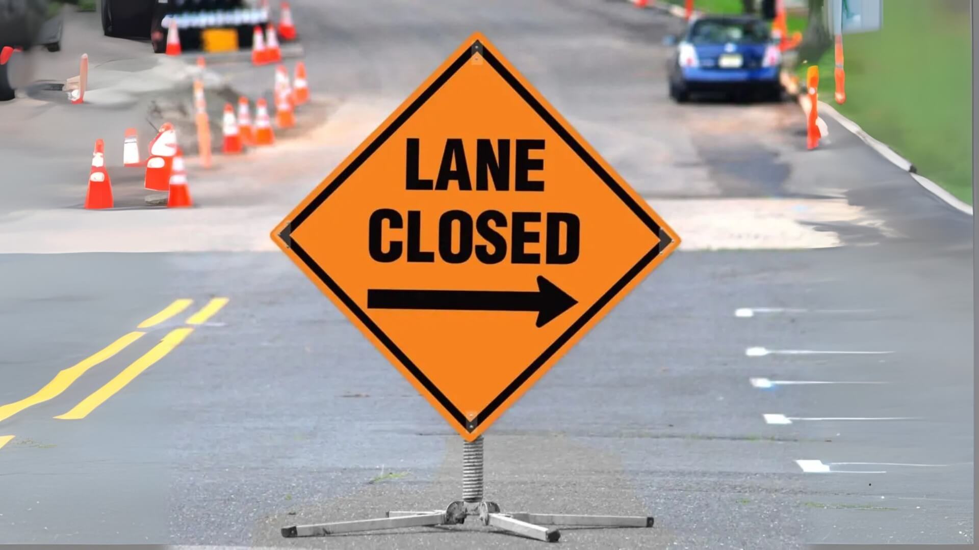 lane closed arrow road signs