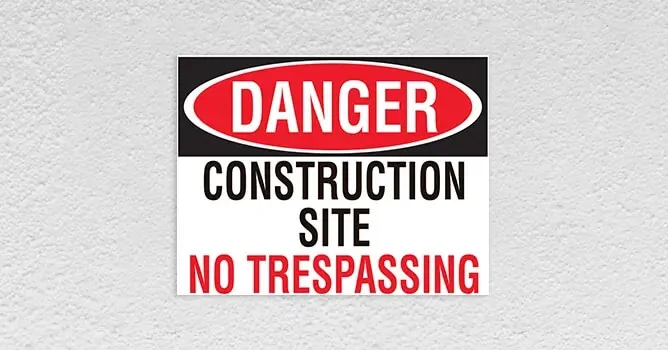 no trespassing construction site warning signs