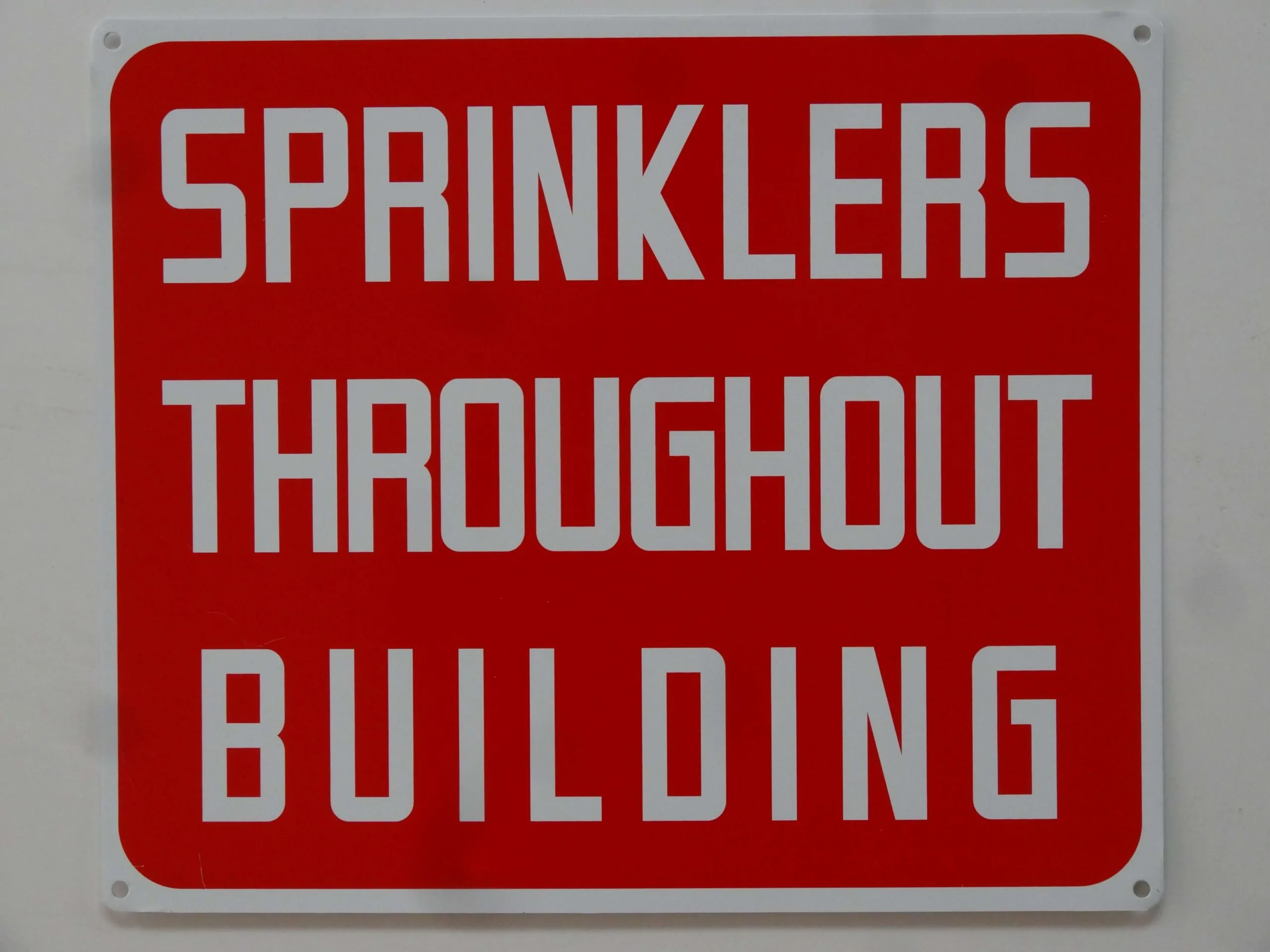 sprinklers building fire safety signs