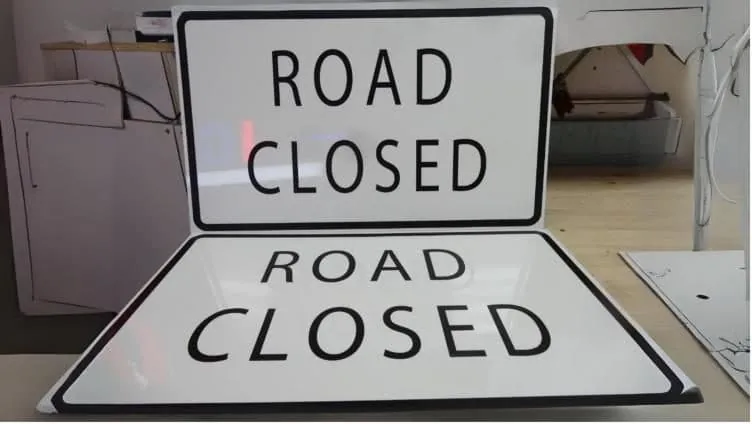 Road Closed signs, black on white