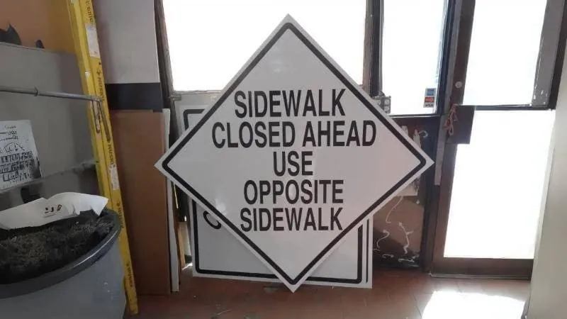 Sidewalk Closed Ahead signs in our shop