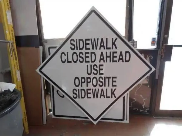 Sidewalk Closed Ahead signs made at the Signs NYC shop